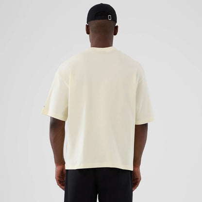 The model is wearing this NBA Hardwood Classic Vancouver Grizzlies T-Shirt in Cream. 2
