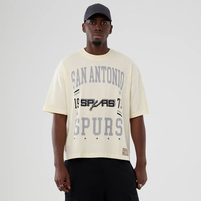 The model is wearing this NBA Hardwood Classic San Antonio Spurs T-Shirt in Cream . 1