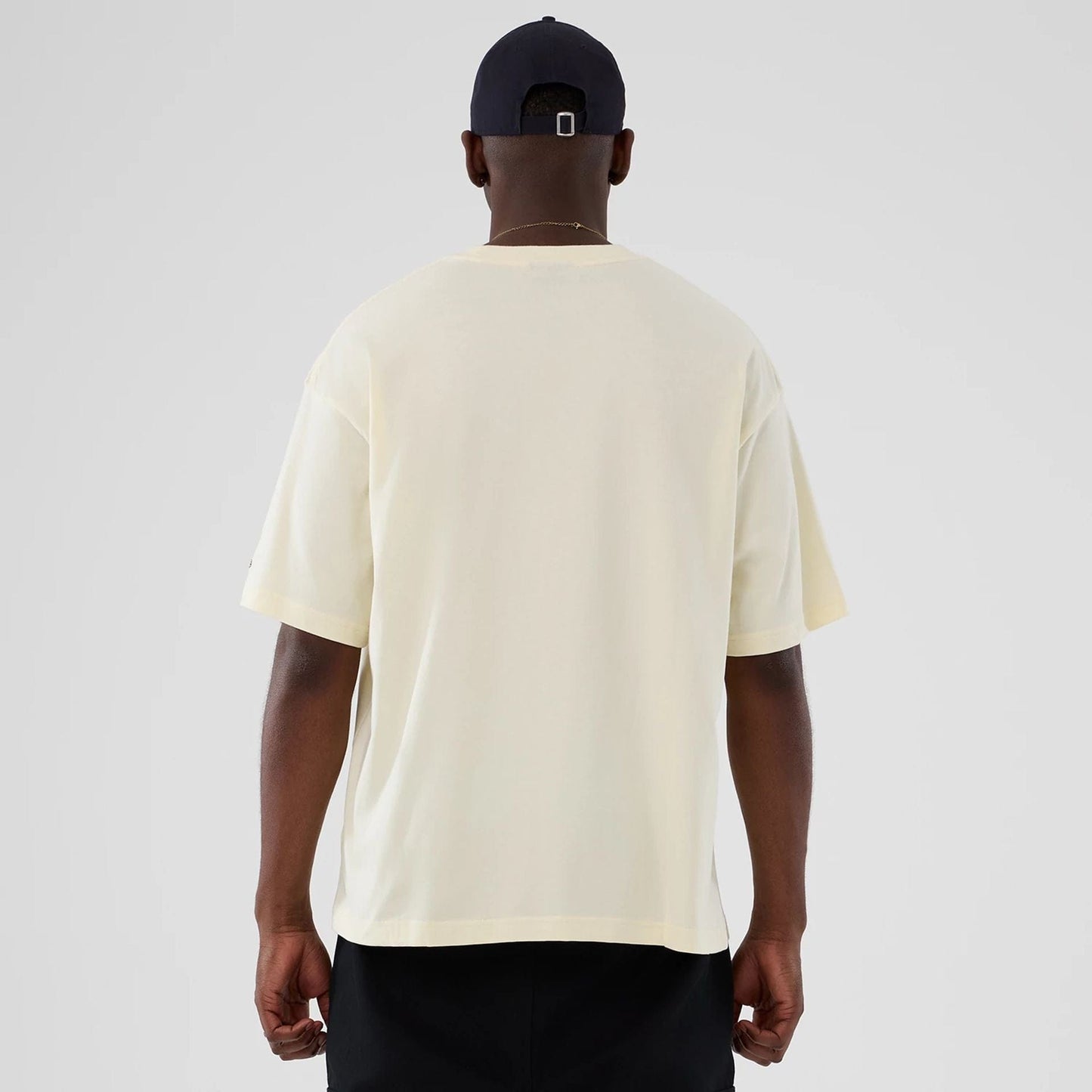 The model is wearing this NBA Hardwood Classic Utah Jazz T-Shirt in Cream. 2