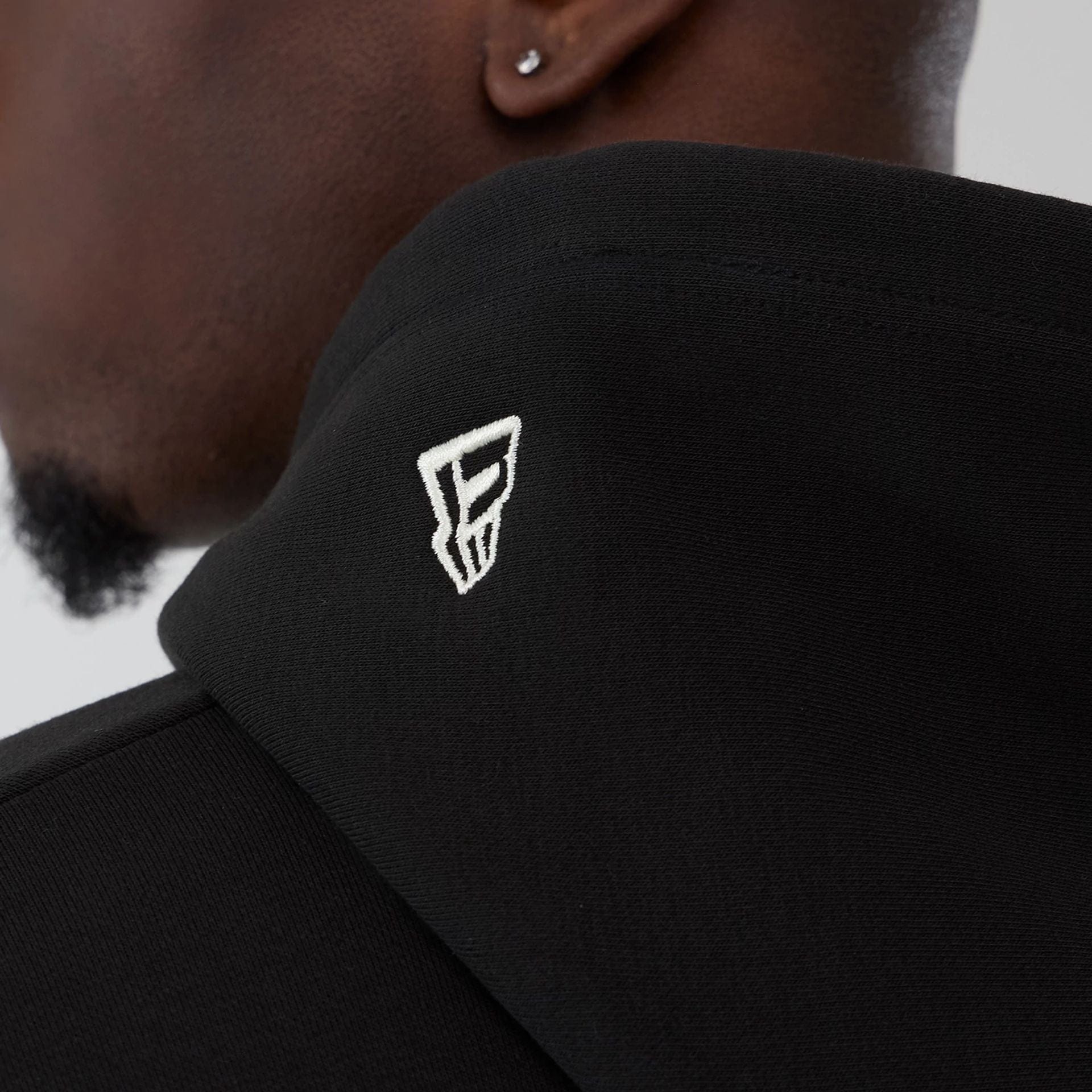 The model is wearing this NBA Hardwood Classic LA Lakers Pullover Hoodie in black. 6