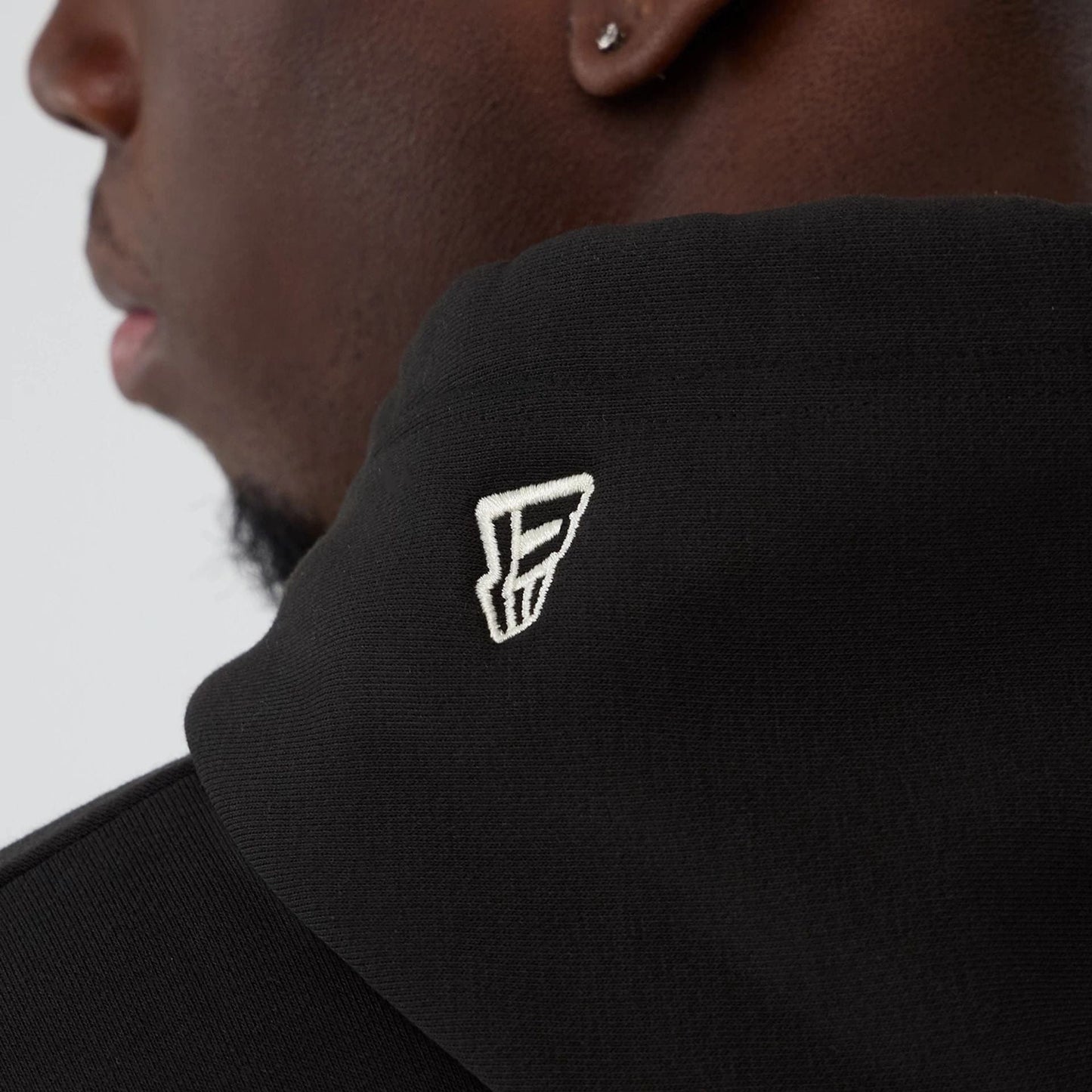 The model is wearing this NBA Hardwood Classic Boston Celtics Pullover Hoodie in black. 6