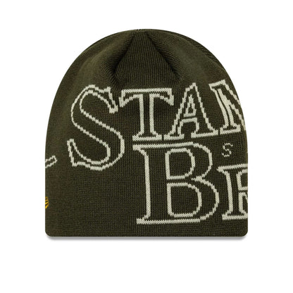 Pictured is this Speedway Chelsea FC Skull Knit Beanie hat in dark green. 2