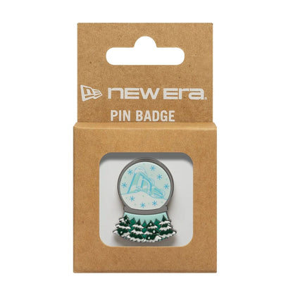 Pictured is this New Era Snow Globe Pin Badge in silver. 3