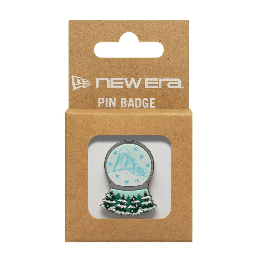 Pictured is this New Era Snow Globe Pin Badge in silver. 3