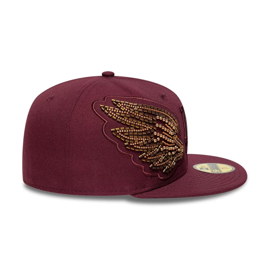 Pictured is this MLB Beaded Wings LA Dodgers 59FIFTY Fitted cap in dark red. 5