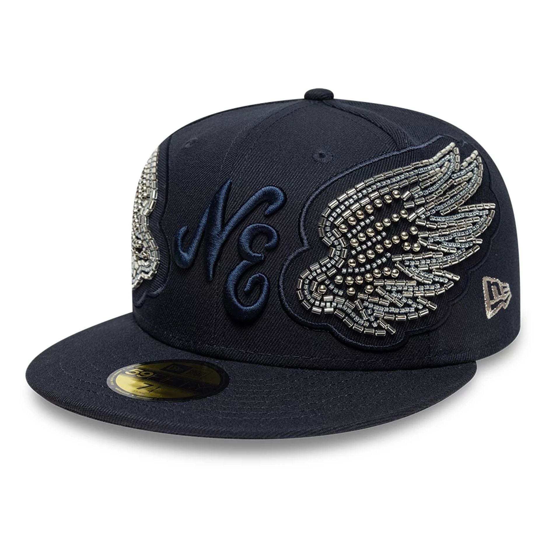 Pictured is this New Era Beaded Wings 59FIFTY Fitted cap in navy. 1
