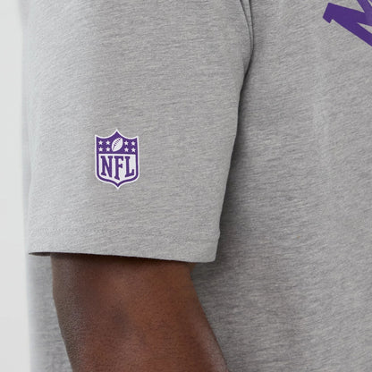 The Male model is wearing Minnesota Vikings NFL International Series Games 2025 Grey Oversized T-Shirt 5