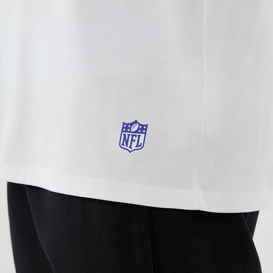 The Male model is wearing LA Rams NFL International Series Games 2025 White Oversized T-Shirt  5
