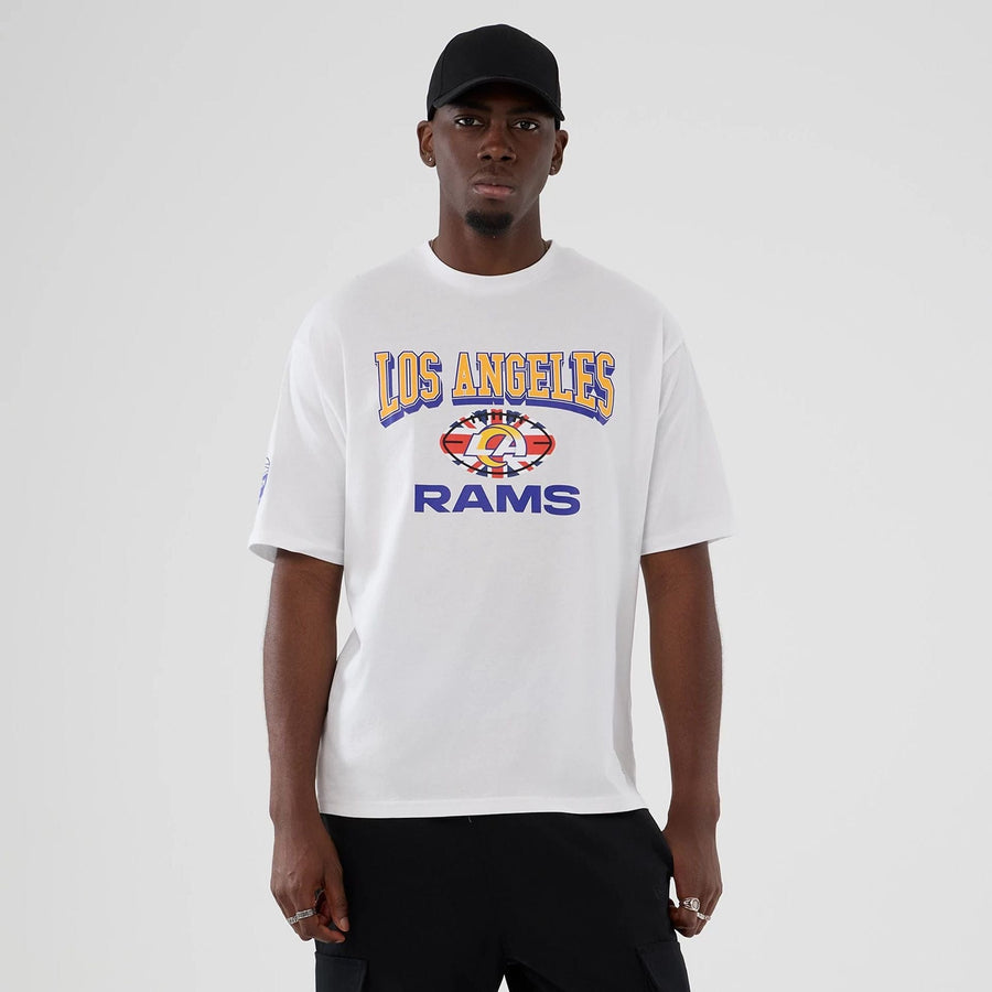 The Male model is wearing LA Rams NFL International Series Games 2025 White Oversized T-Shirt  1