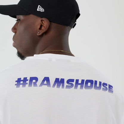 The Male model is wearing LA Rams NFL International Series Games 2025 White Oversized T-Shirt  6