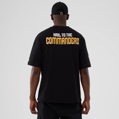 The Male model is wearing Washington Commanders NFL International Series Games 2025 Black Oversized T-Shirt  2