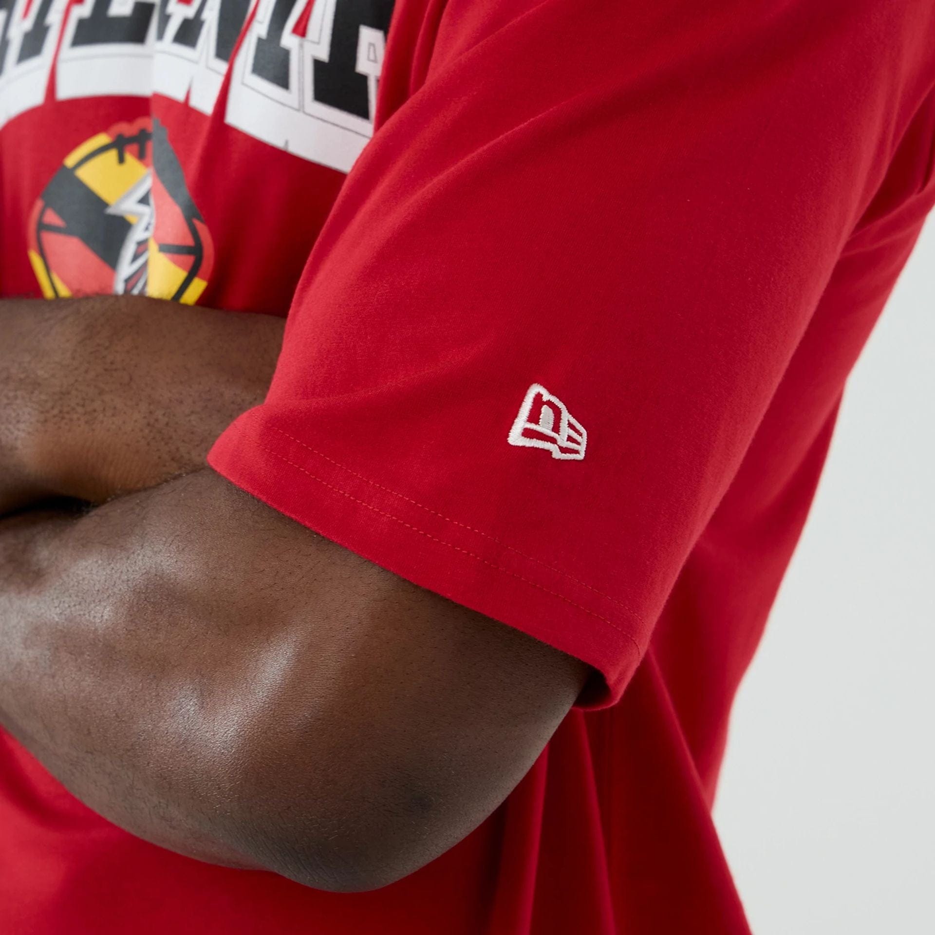 The Male model is wearing Atlanta Falcons NFL International Series Games 2025 Red Oversized T-Shirt  7