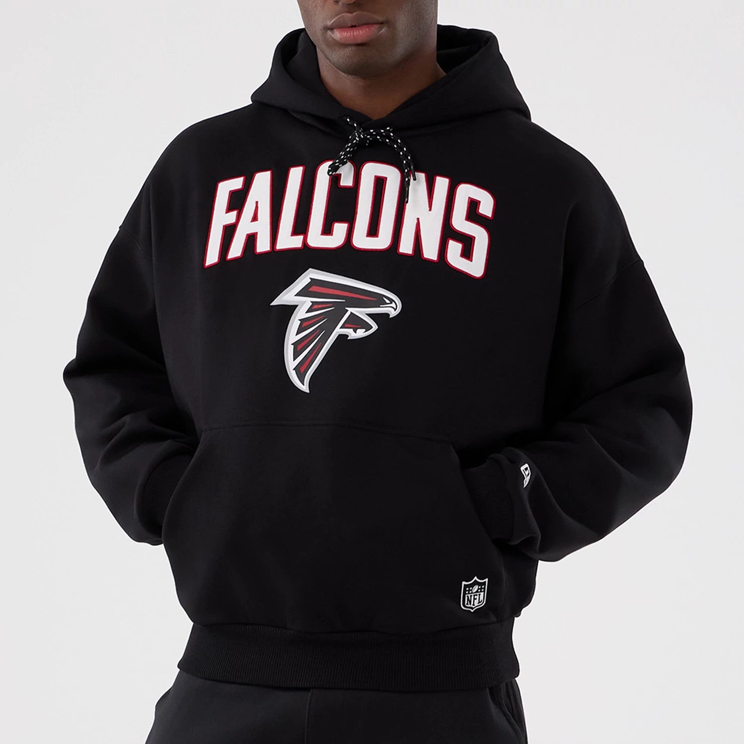 The Male model is wearing Atlanta Falcons NFL International Series Games 2025 Black Premium Pullover Hoodie 7