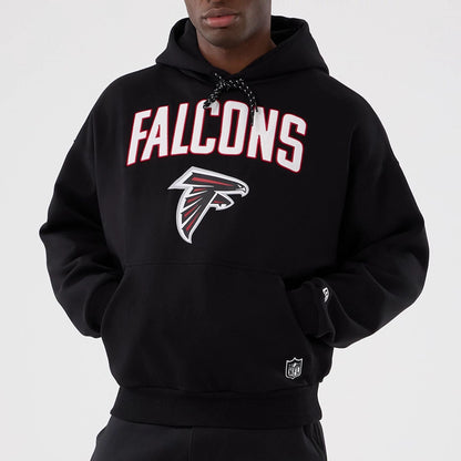 The Male model is wearing Atlanta Falcons NFL International Series Games 2025 Black Premium Pullover Hoodie  7
