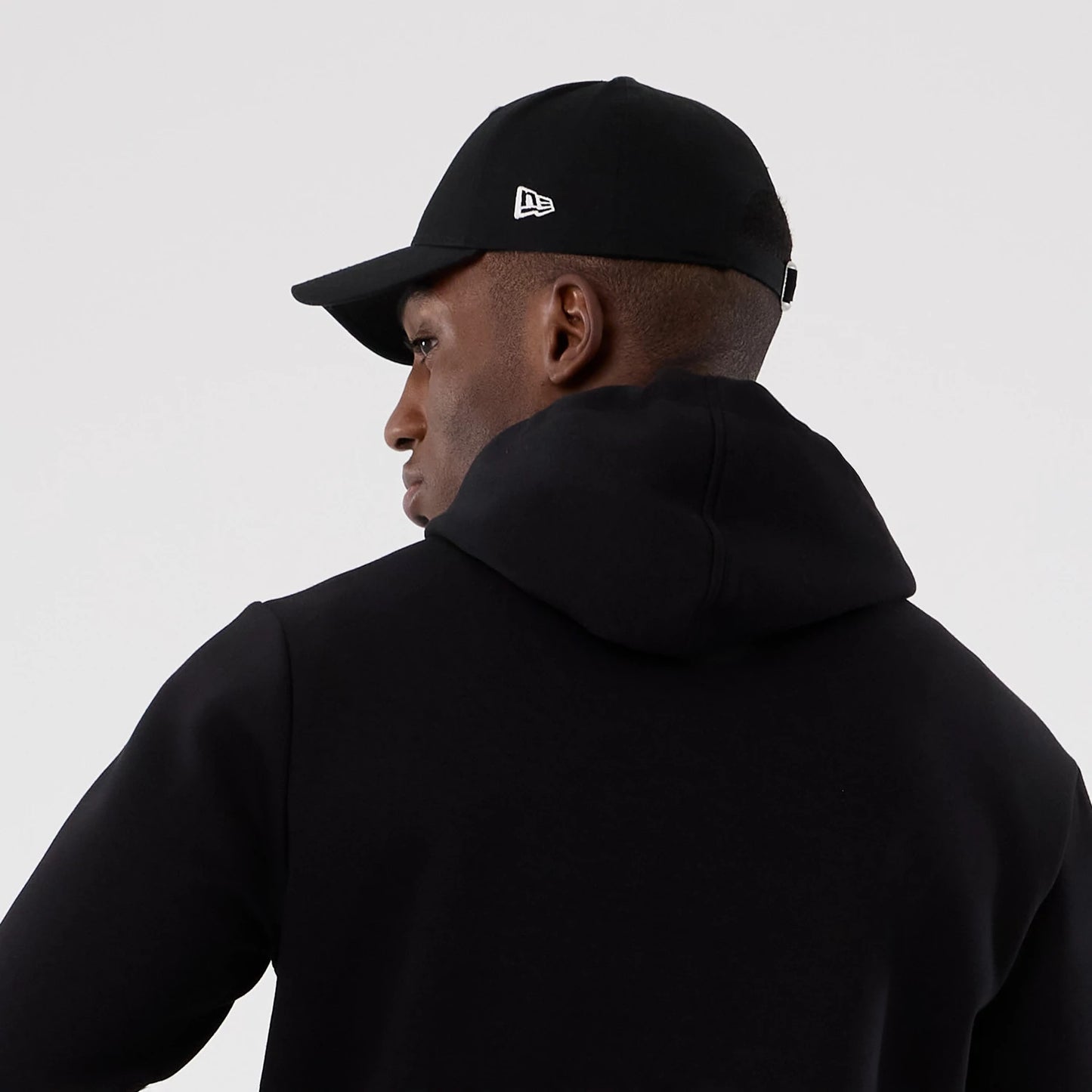 The Male model is wearing Minnesota Vikings NFL International Series Games 2025 Black Pullover Hoodie 6