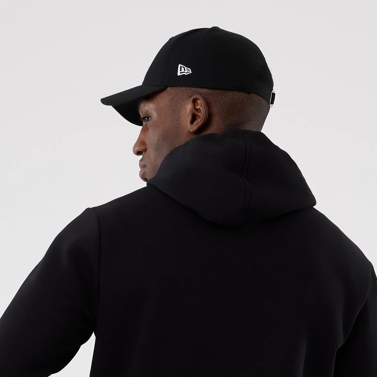 The Male model is wearing Minnesota Vikings NFL International Series Games 2025 Black Pullover Hoodie 6
