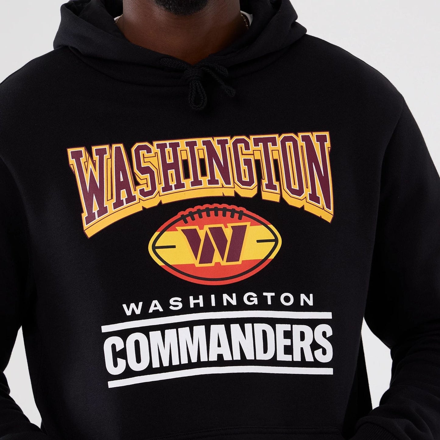 The Male model is wearing Washington Commanders NFL International Series Games 2025 Black Pullover Hoodie 3