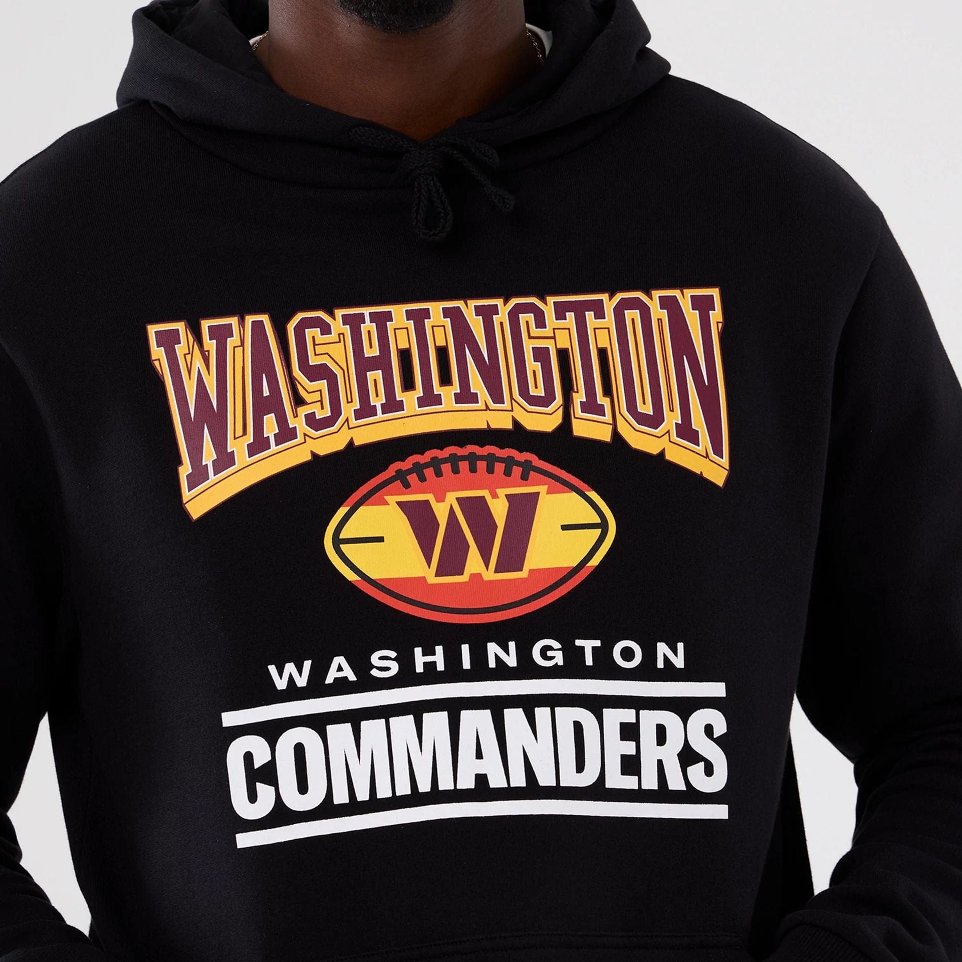 The Male model is wearing Washington Commanders NFL International Series Games 2025 Black Pullover Hoodie  3