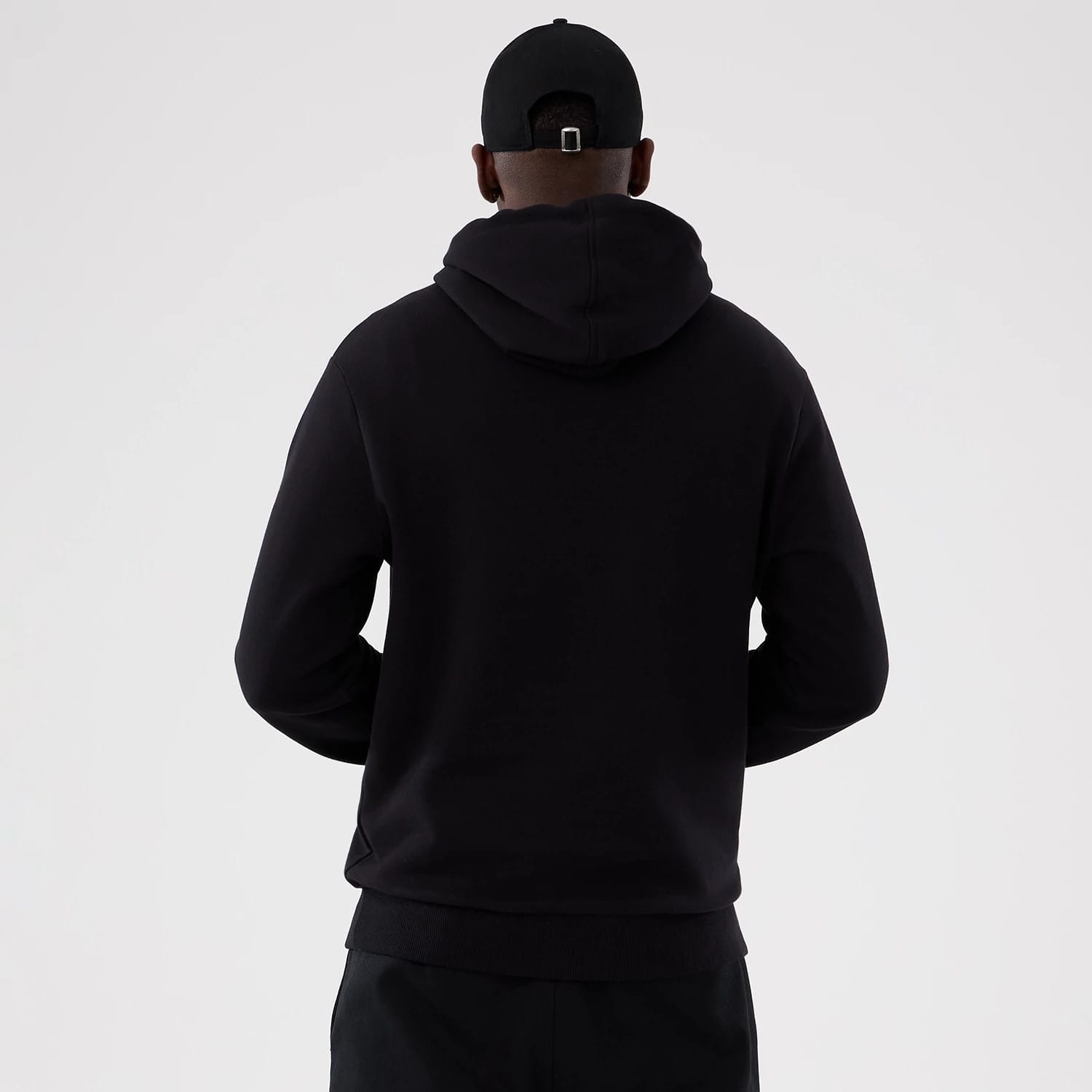 The Male model is wearing Washington Commanders NFL International Series Games 2025 Black Pullover Hoodie 2