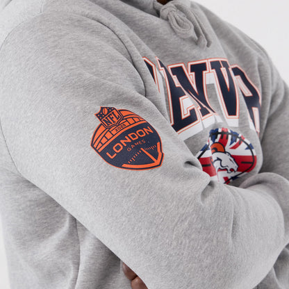 The Male model is wearing Denver Broncos NFL International Series Games 2025 Grey Pullover Hoodie 4