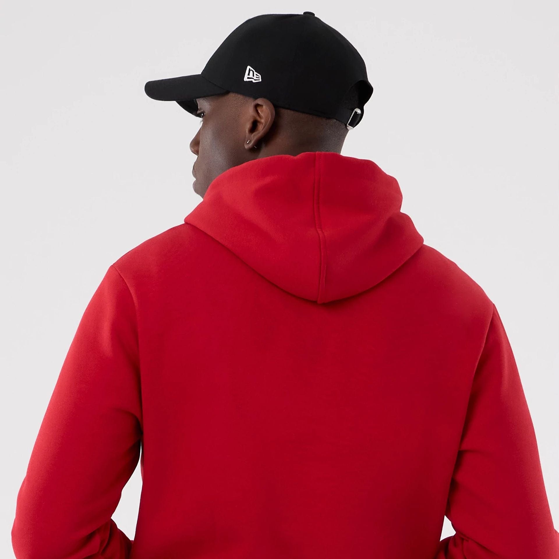 The Male model is wearing Atlanta Falcons NFL International Series Games 2025 Red Pullover Hoodie  7