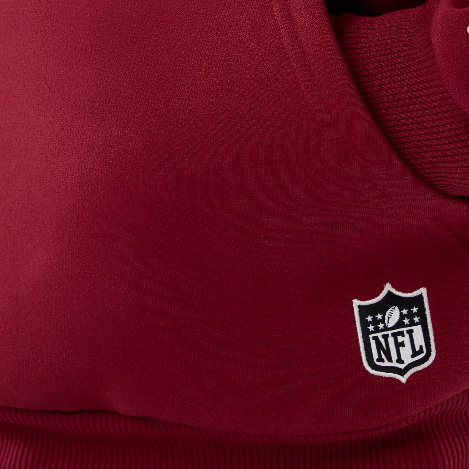The Male model is wearing Washington Commanders NFL International Series Games 2025 Dark Red Premium Pullover Hoodie 4