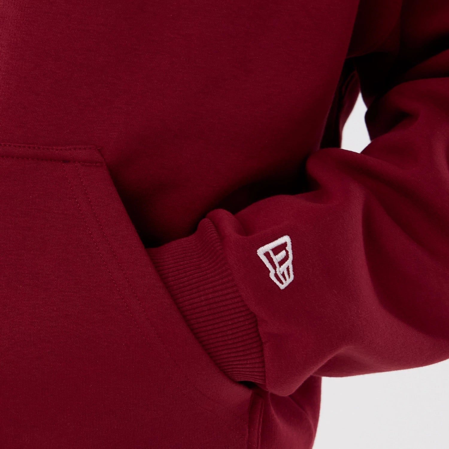 The Male model is wearing Washington Commanders NFL International Series Games 2025 Dark Red Premium Pullover Hoodie 5