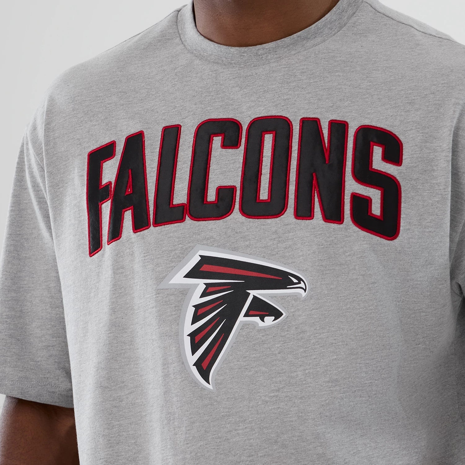 The Male model is wearing Atlanta Falcons NFL International Series Games 2025 Grey Premium T-Shirt 3