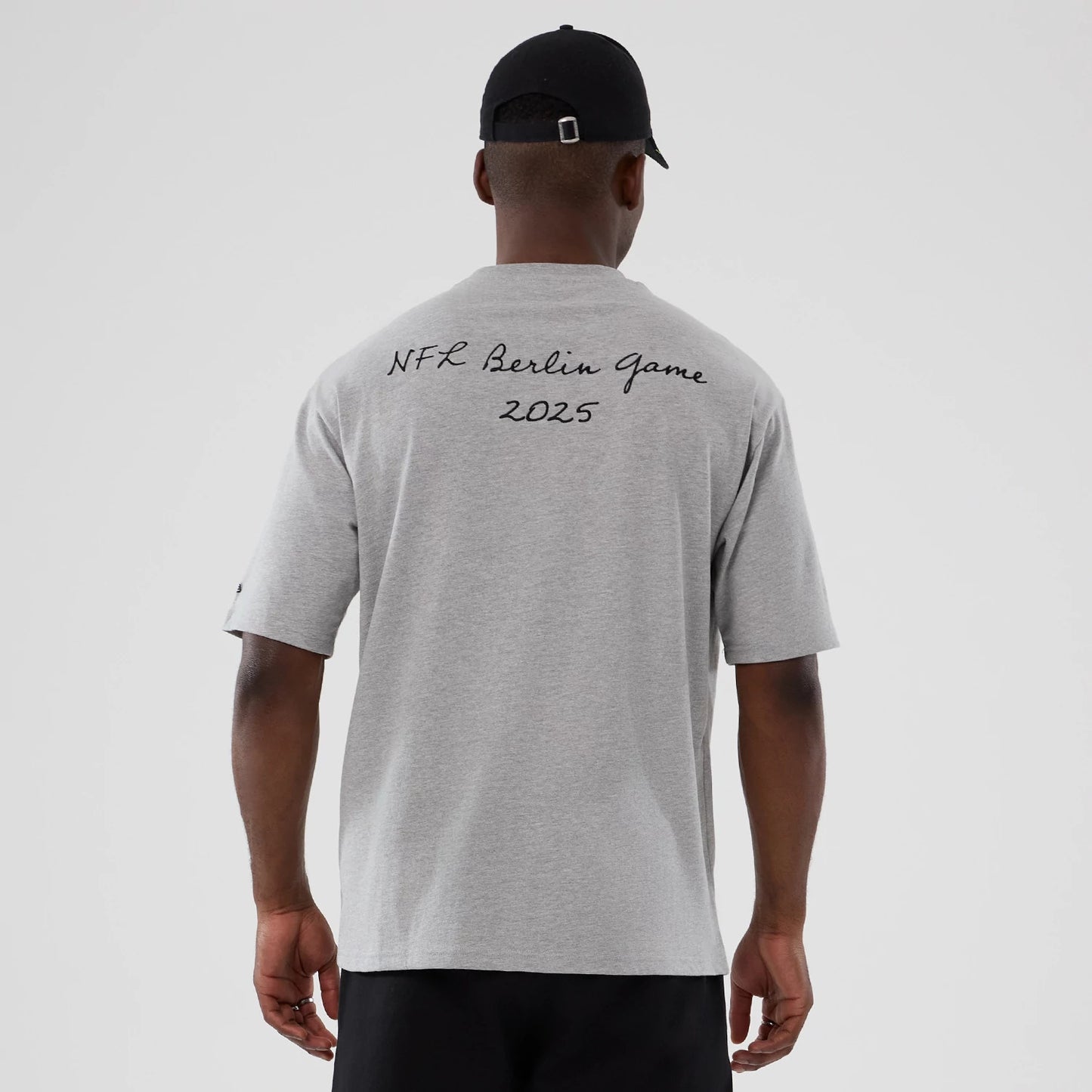 The Male model is wearing Atlanta Falcons NFL International Series Games 2025 Grey Premium T-Shirt 2