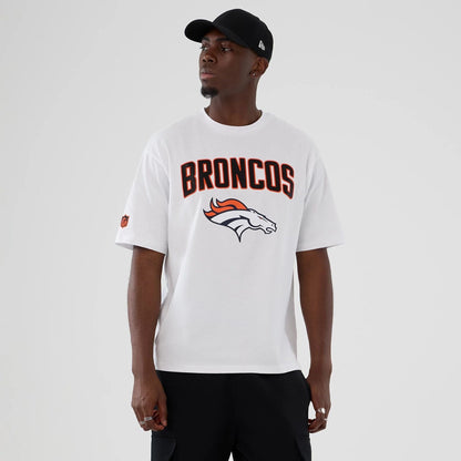 The Male model is wearing Denver Broncos NFL International Series Games 2025 White Premium T-Shirt  1