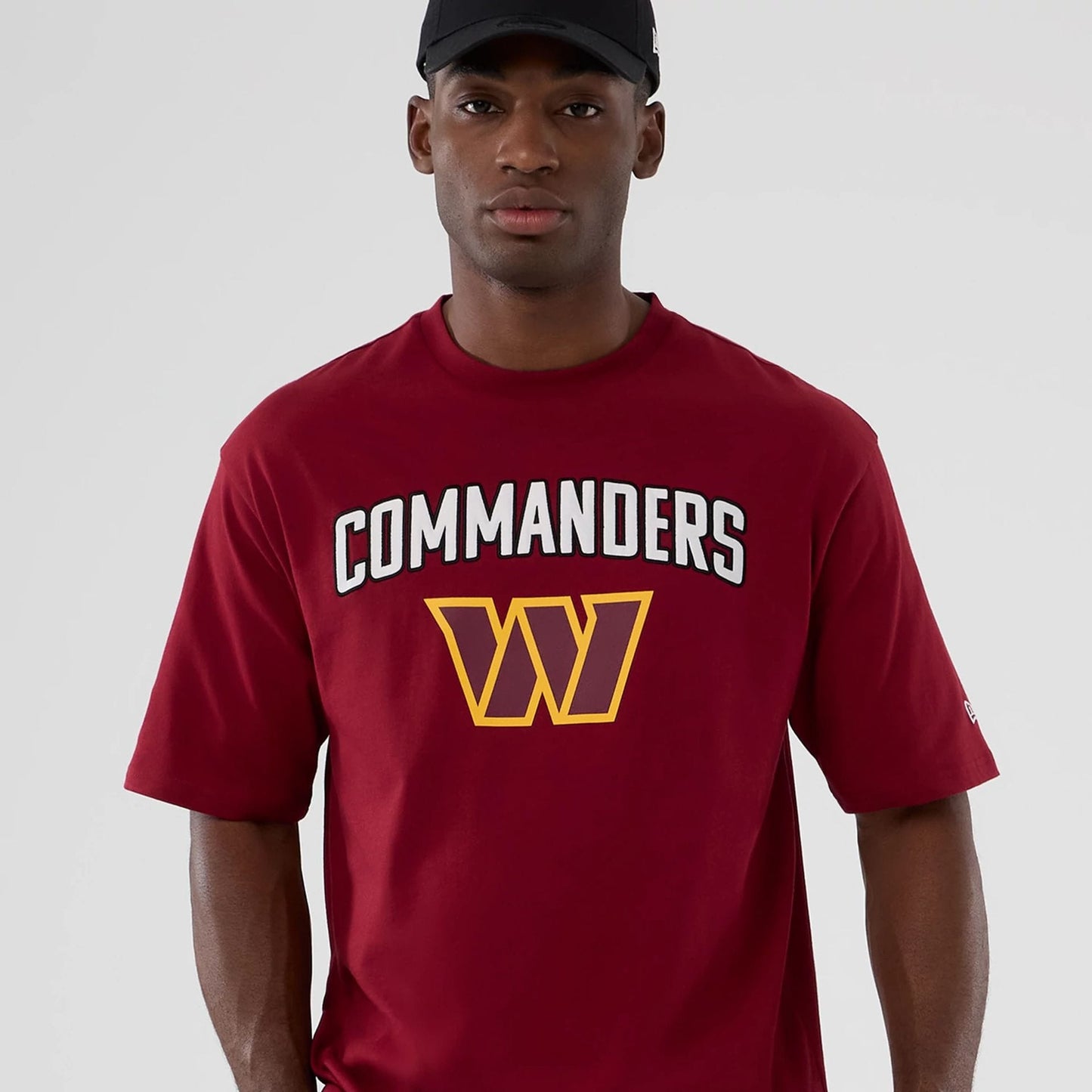 The Male model is wearing Washington Commanders NFL International Series Games 2025 Dark Red Premium T-Shirt 5