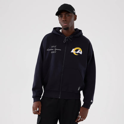 New Era LA Rams NFL International Series Games 2025 Navy Premium Pullover Hoodie, front view showing the LA Rams embroidered logo on the left chest, NFL London Games 2025 lettering on the right, and a New Era logo embroidered on the left cuff.