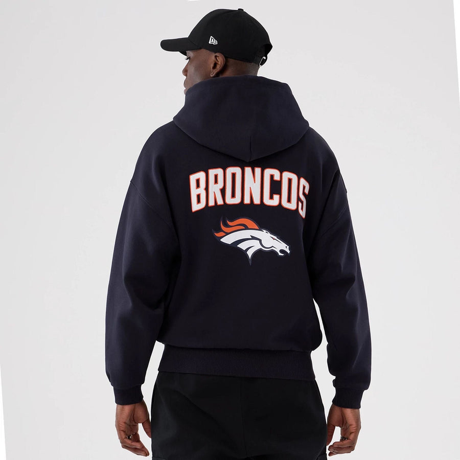 The Male model is wearing Denver Broncos NFL International Series Games 2025 Navy Premium Pullover Hoodie  2