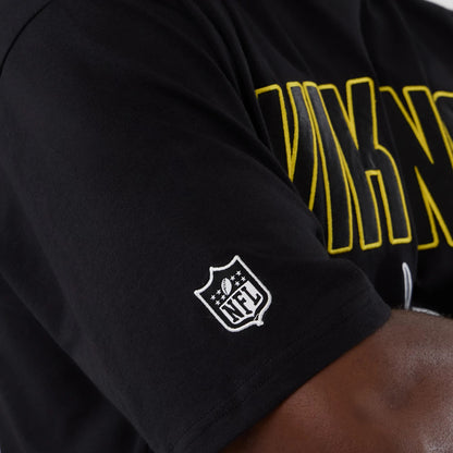 The Male model is wearing Minnesota Vikings NFL International Series Games 2025 Black Premium T-Shirt 4