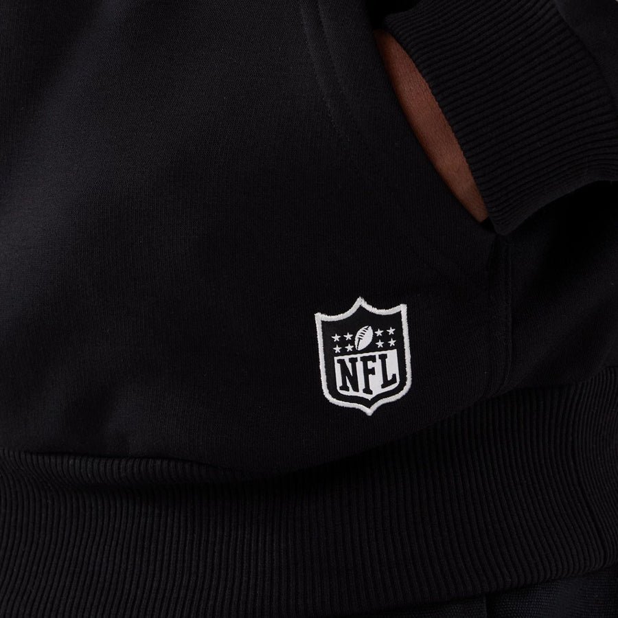 The Male model is wearing Minnesota Vikings NFL International Series Games 2025 Black Premium Pullover Hoodie  4