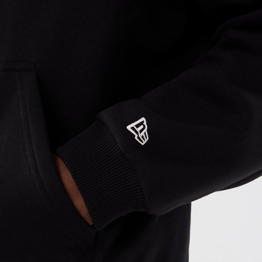 The Male model is wearing Minnesota Vikings NFL International Series Games 2025 Black Premium Pullover Hoodie  5