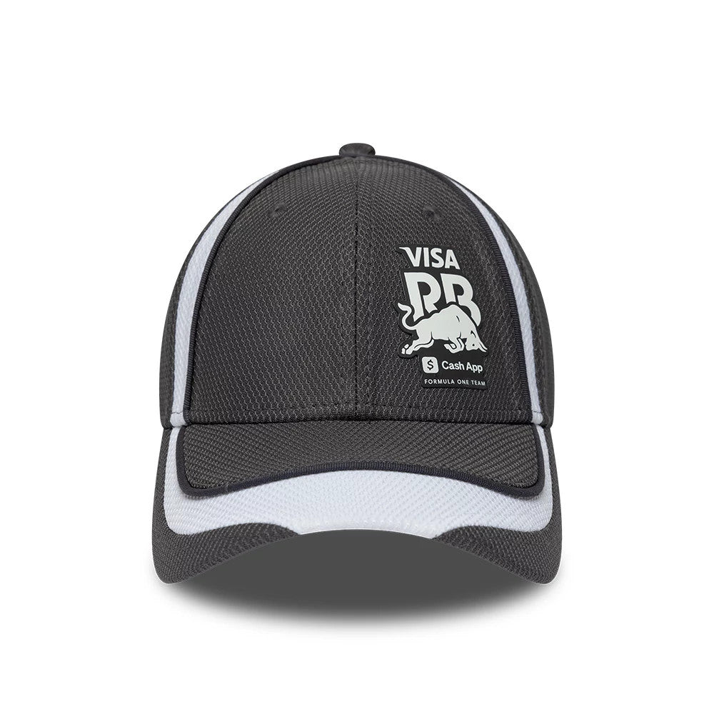 Visa Cash App Racing Bulls F1 Race Special Dark Grey New Era 9FORTY Adjustable Cap, front view showing a white frontal logo with text and a bull graphic, complemented by white mesh accents and a curved dark grey visor.