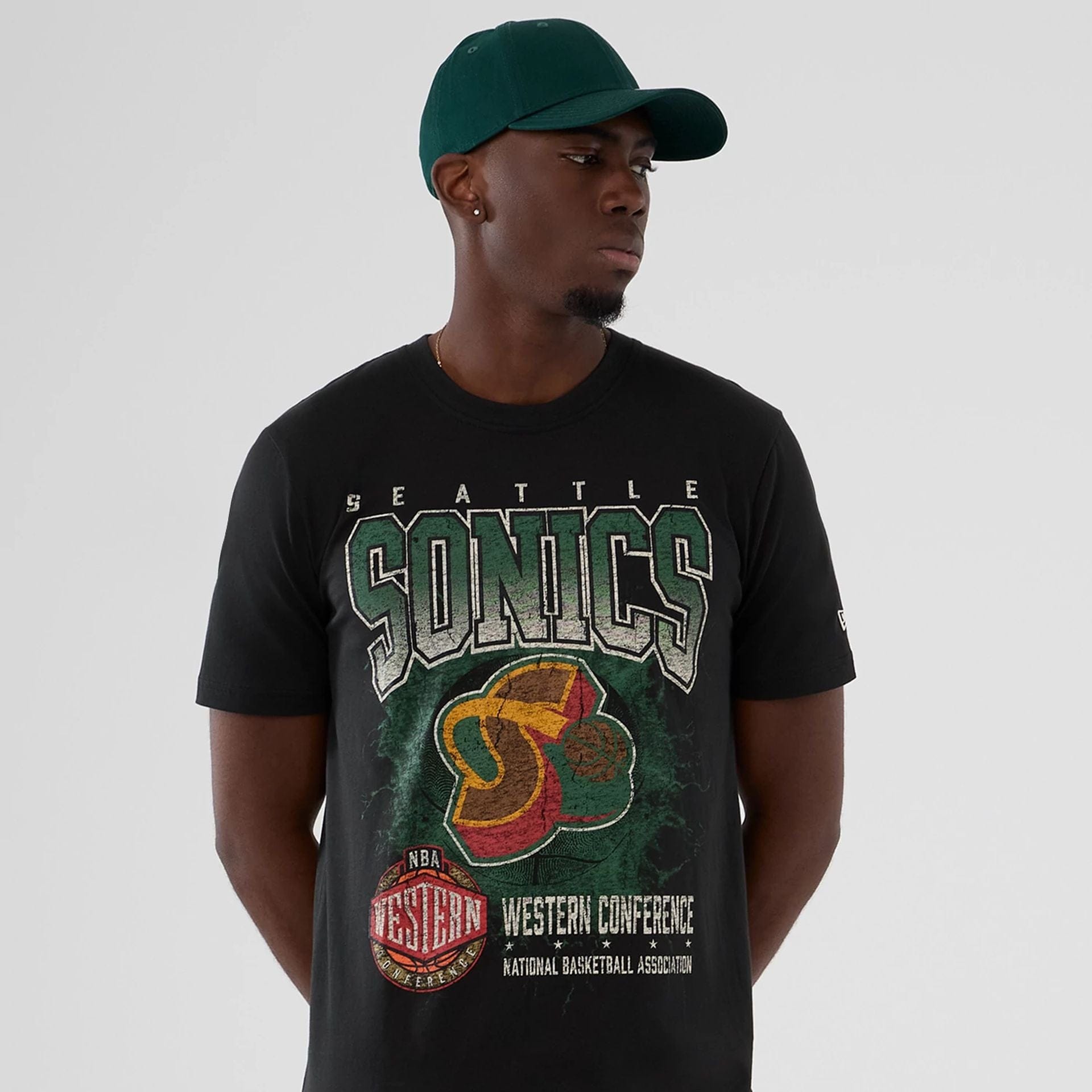 The model is wearing this NBA Hardwood Classic Seattle Supersonics T-Shirt in black. 6