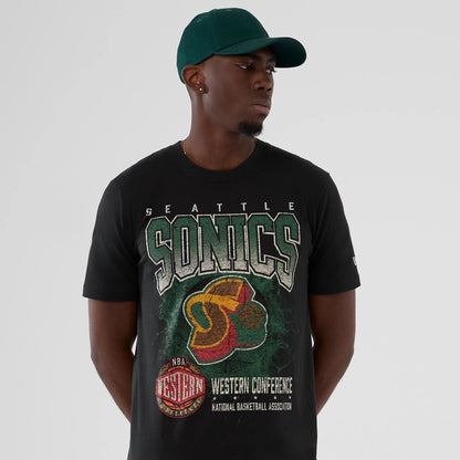 The model is wearing this NBA Hardwood Classic Seattle Supersonics T-Shirt in black. 6