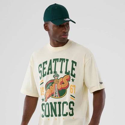 The model is wearing this NBA Hardwood Classic Seattle Supersonics T-Shirt in Cream . 7
