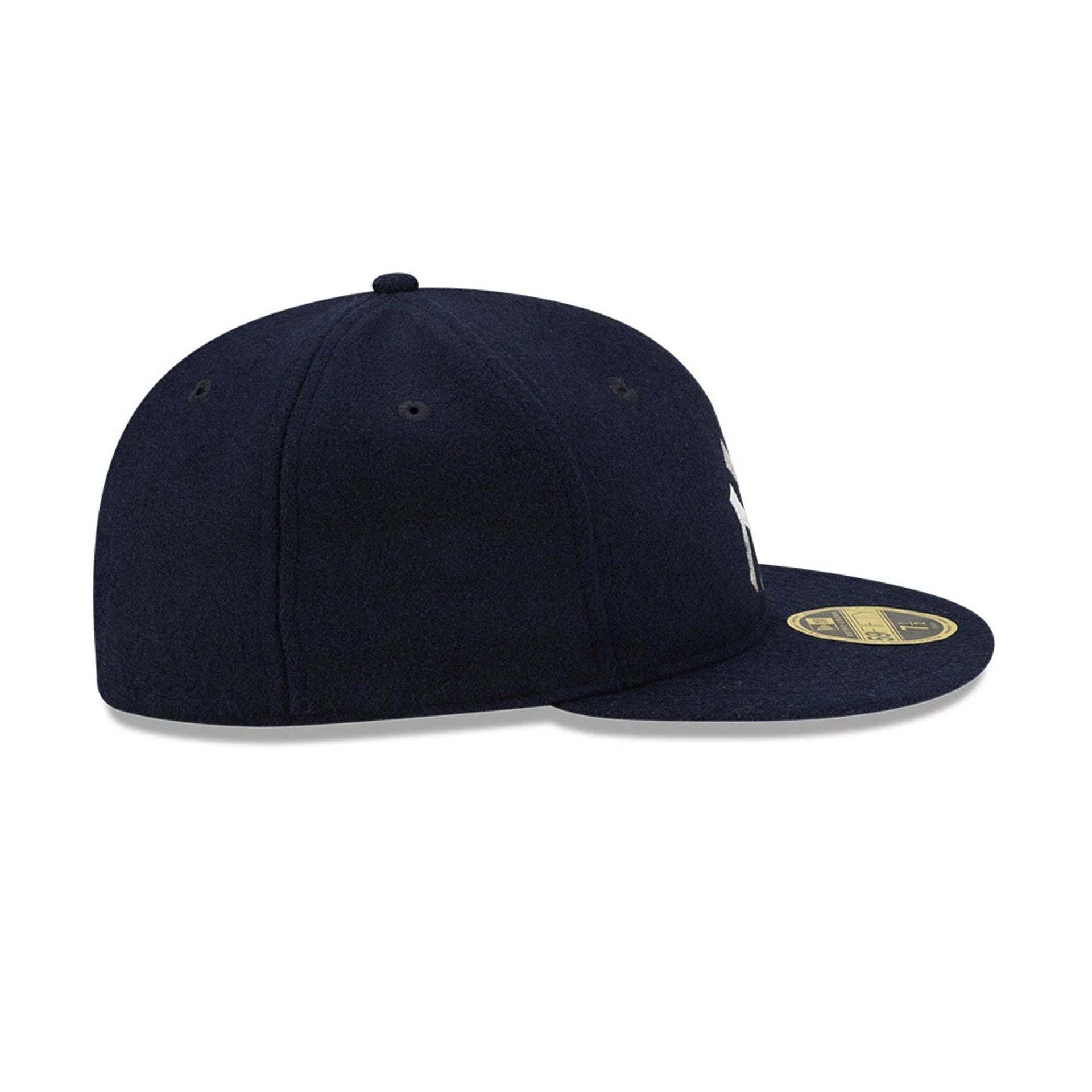 Pictured is this FOG X MLB New York Yankees Retro Crown 59FIFTY Fitted cap in navy. 7