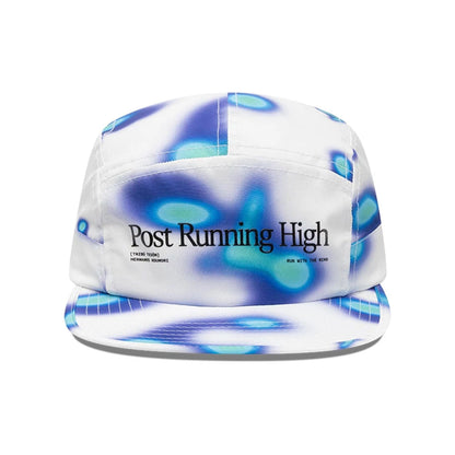 Pictured is this Hermanos Koumori x New Era Camper cap in white. 2
