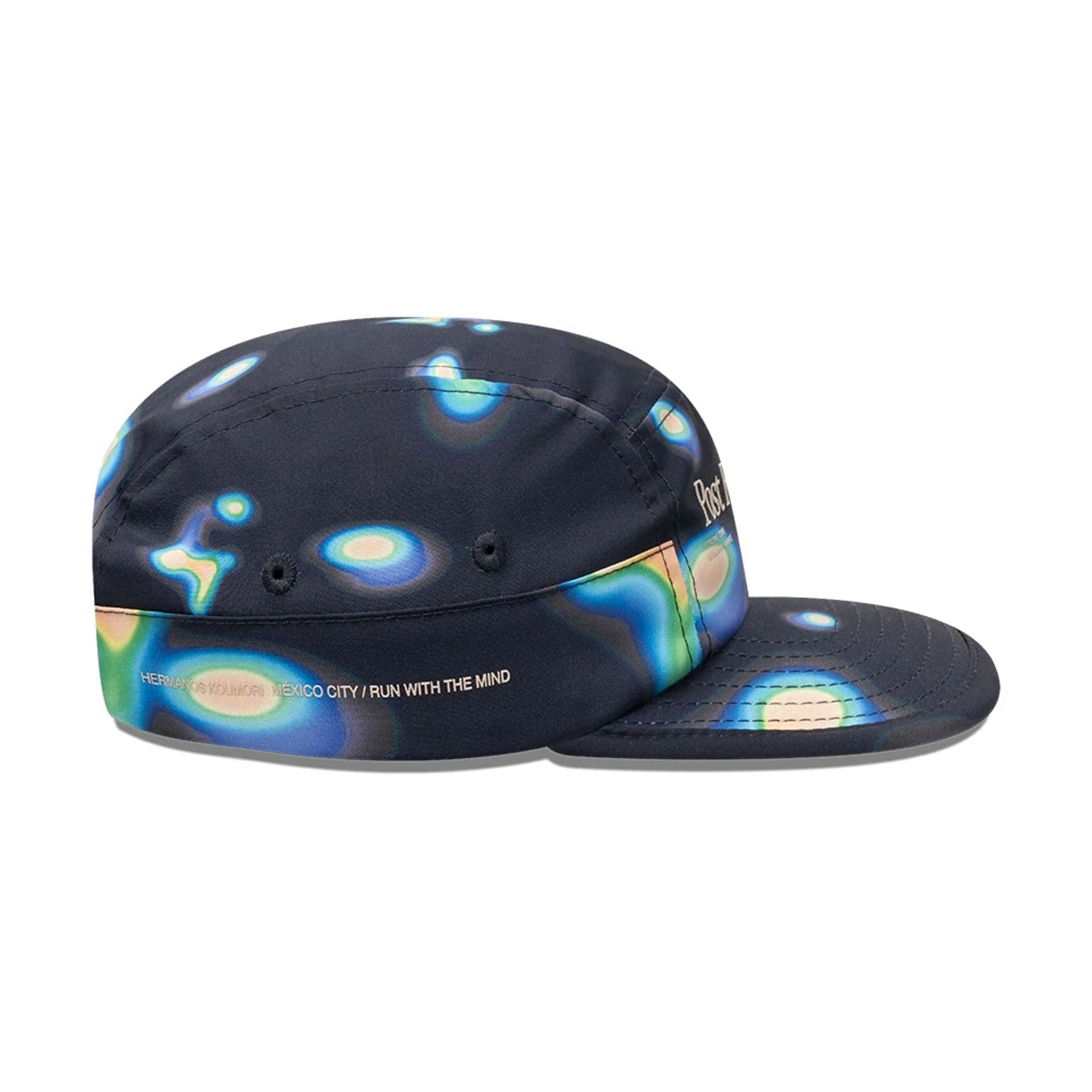 Pictured is this Hermanos Koumori x New Era Camper cap in navy. 4