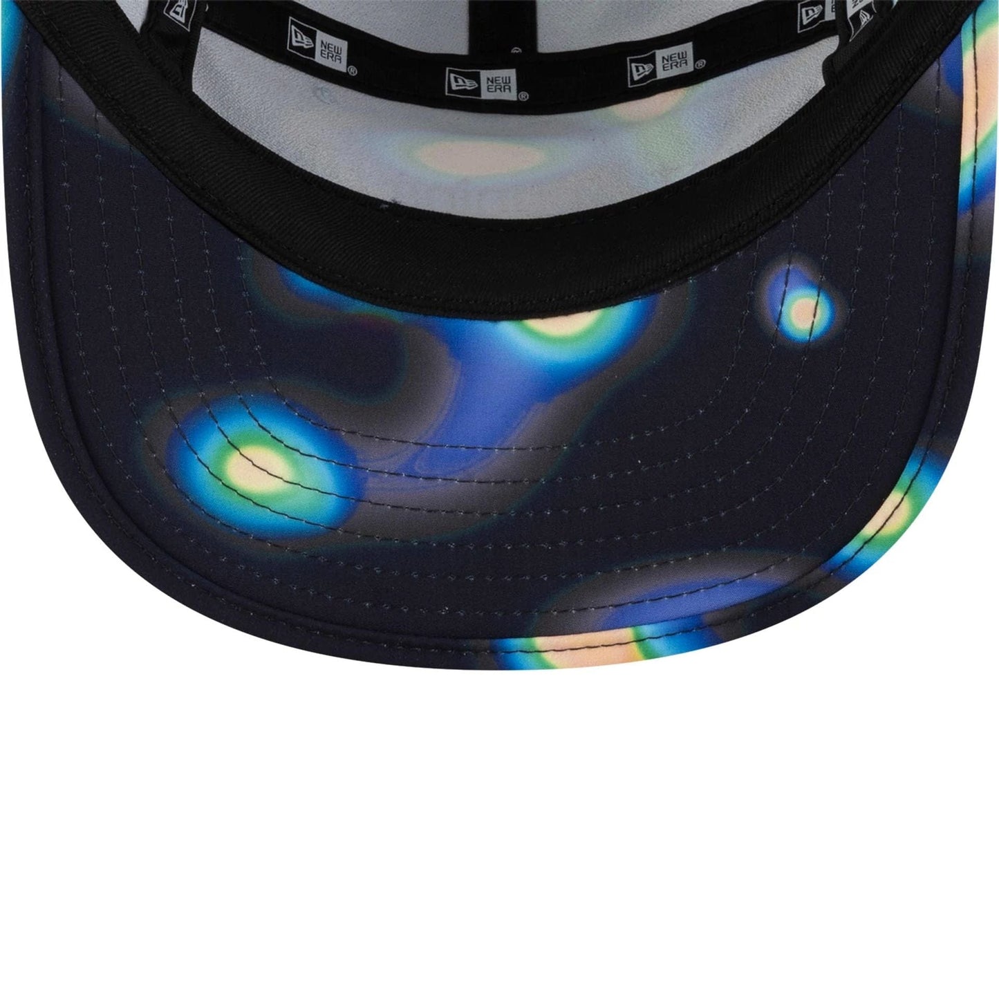 Pictured is this Hermanos Koumori x New Era Camper cap in navy. 6