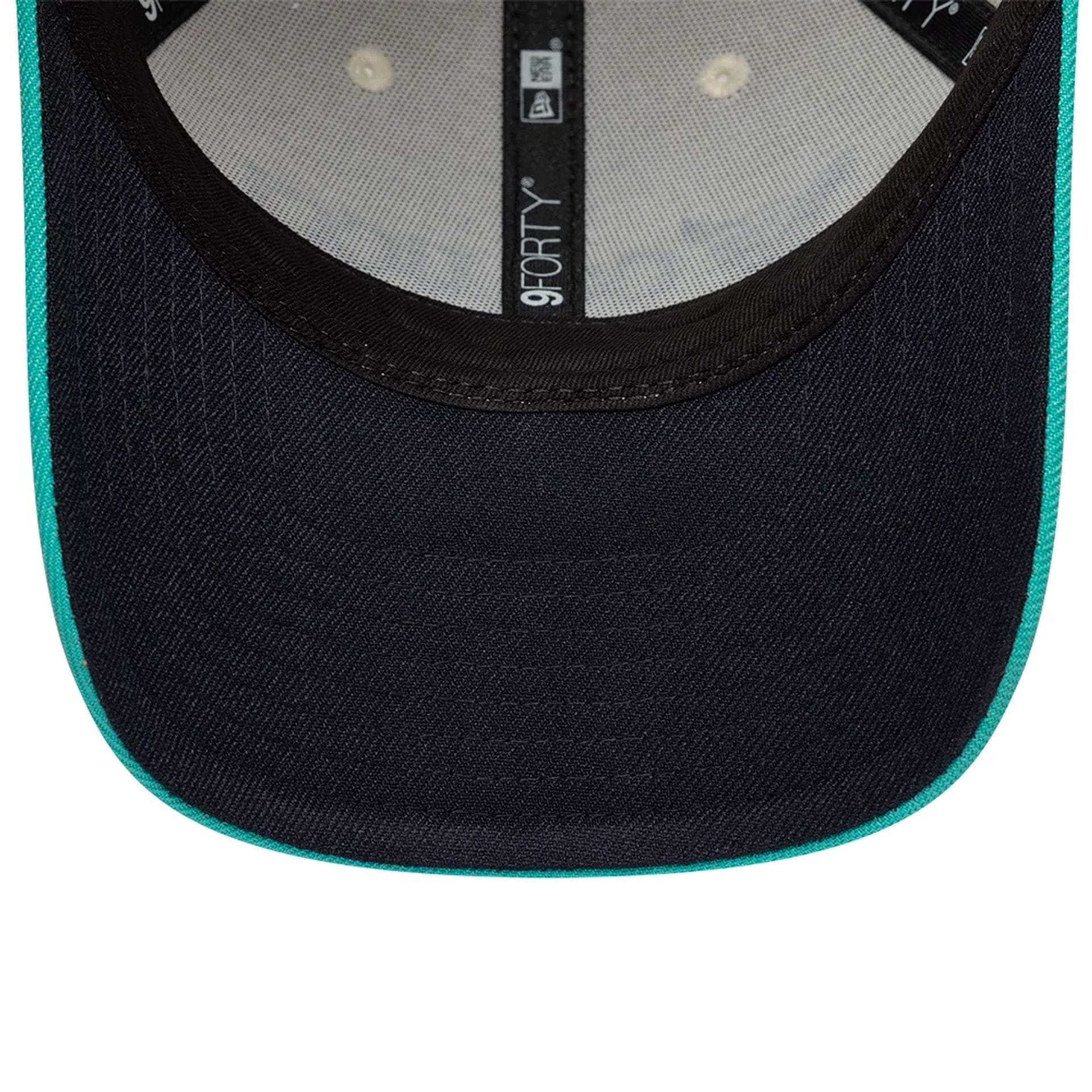 Pictured is this Colucci X New Era 9FORTY cap in white. 2