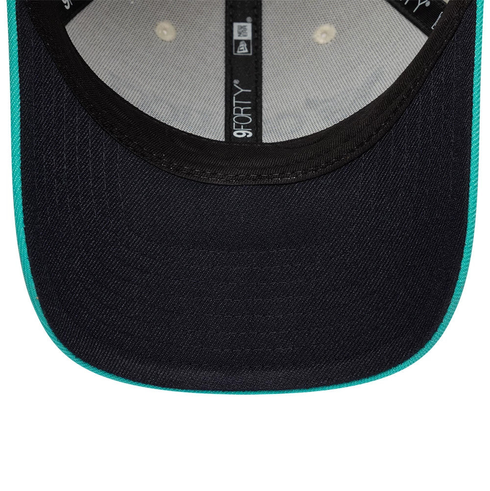 Pictured is this Colucci X New Era 9FORTY cap in white. 2