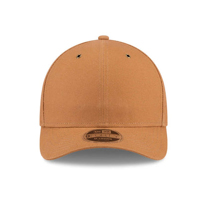 Pictured is this New Era 9FORTY M-Crown cap in beige. 4