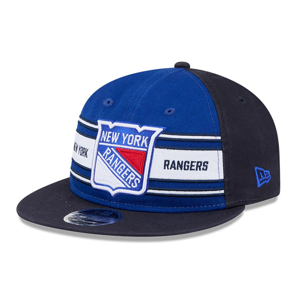 New York Rangers NHL Team Stripes Blue Retro Crown New Era 9FIFTY Adjustable Cap, front view with a blue and white embroidered team logo on the structured blue crown, navy flat visor, and a 9FIFTY size sticker.