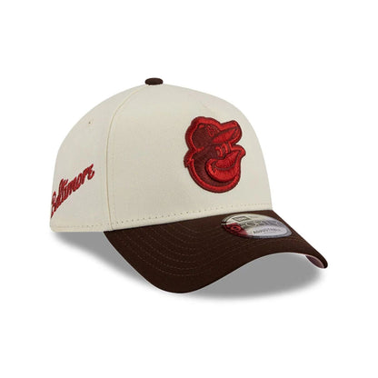 Pictured is this MLB City Script Baltimore Orioles 9FORTY A-Frame cap in Cream. 1