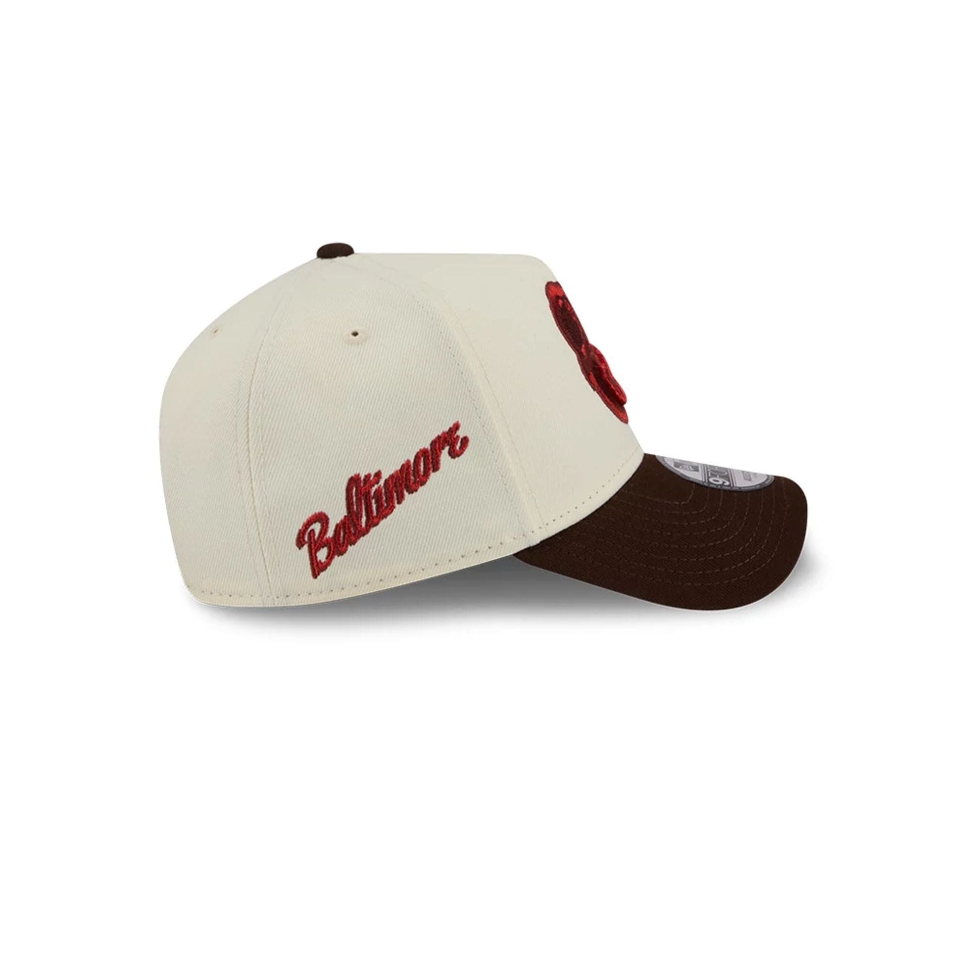 Pictured is this MLB City Script Baltimore Orioles 9FORTY A-Frame cap in Cream. 5